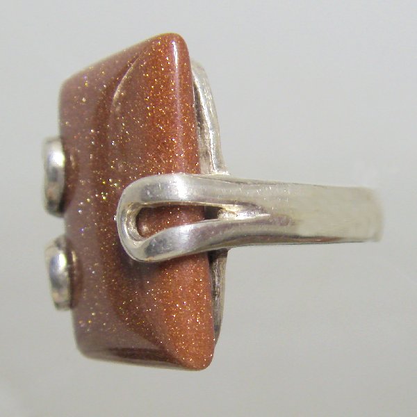 (r1255)Silver ring with rectangular brown stone.